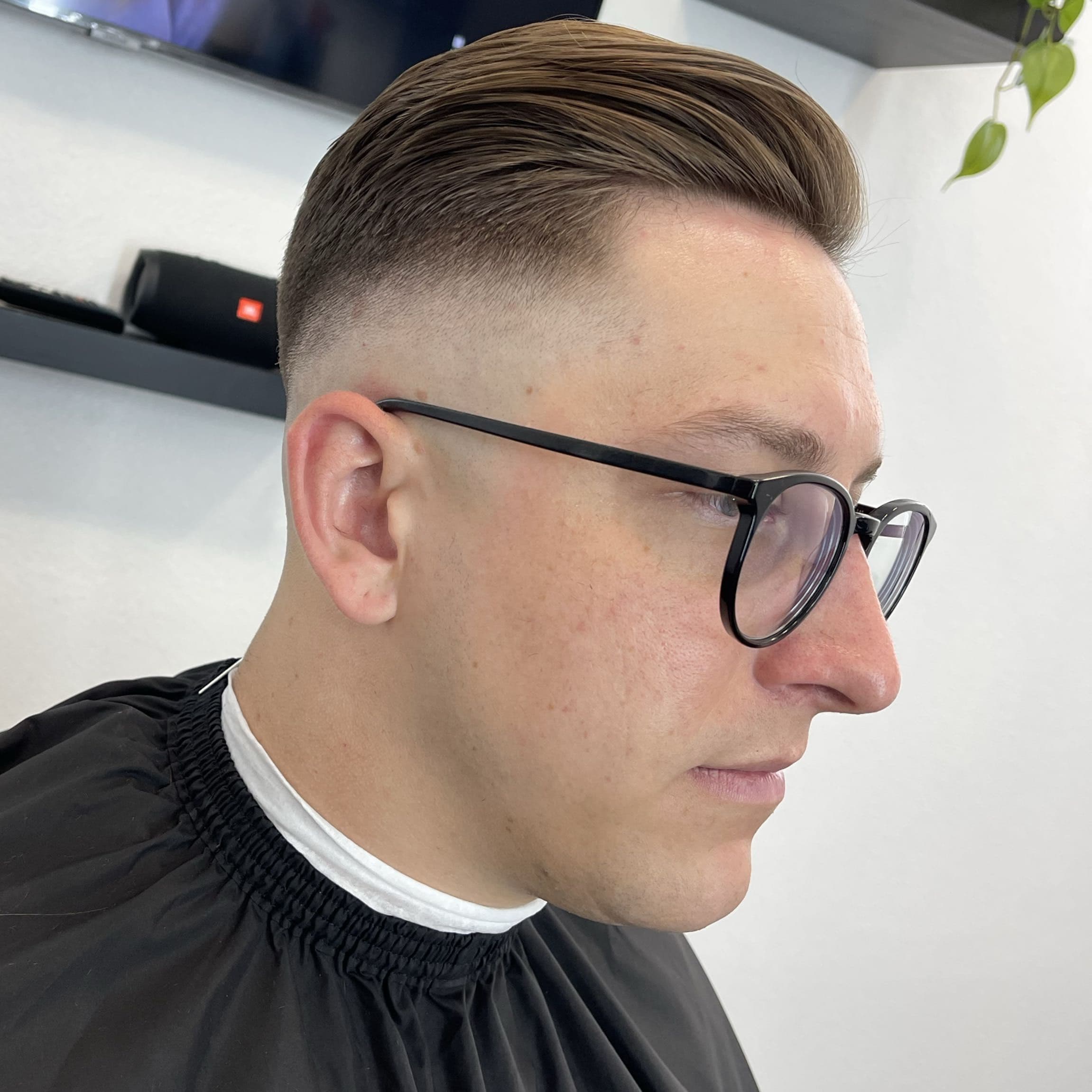 Slicked back taper fade